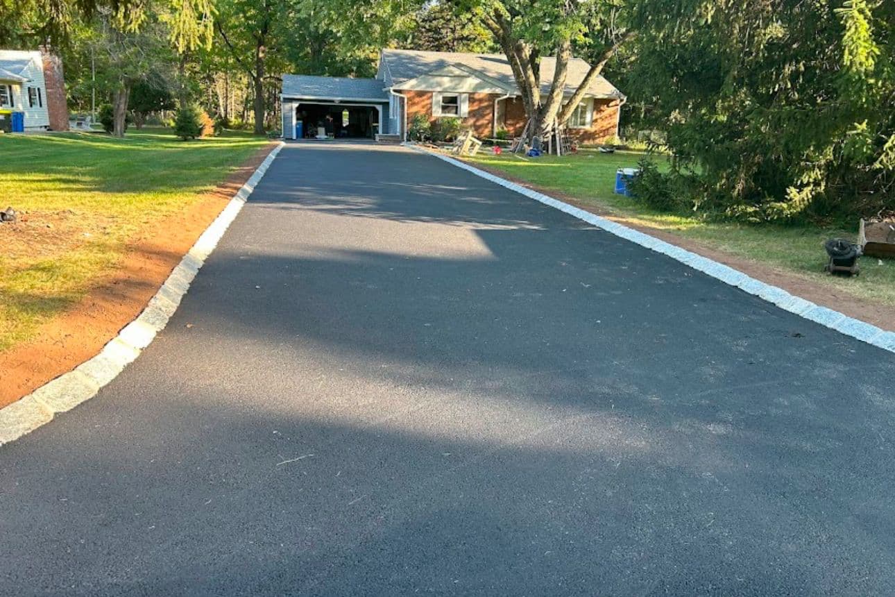 Freshly paved blacktop driveway